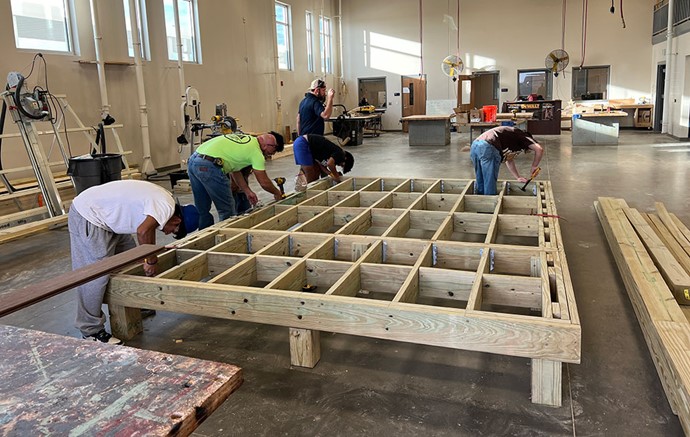Glenn High School students constructing deck framing with YellaWood brand lumber.